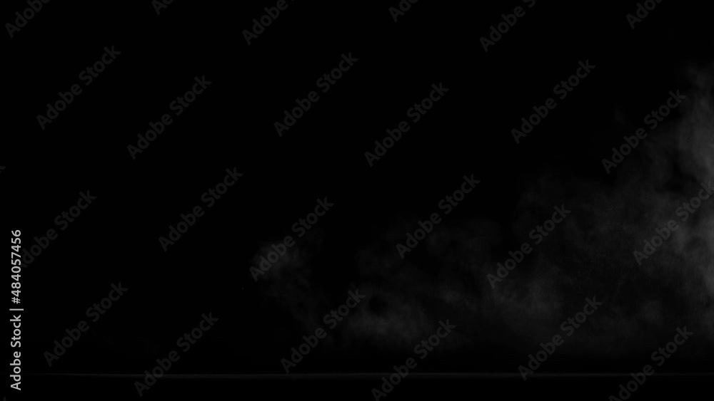 Abstract white smoke in slow motion. Smoke, Cloud of cold fog in light spot background. Light, white, fog, cloud, black background, 4k, ice smoke cloud. Floating fog. Abstract white smoke in slow motion. Smoke, Cloud of cold fog in light spot background. Light, white, fog, cloud, black background, 4k, ice smoke cloud. Floating fog.