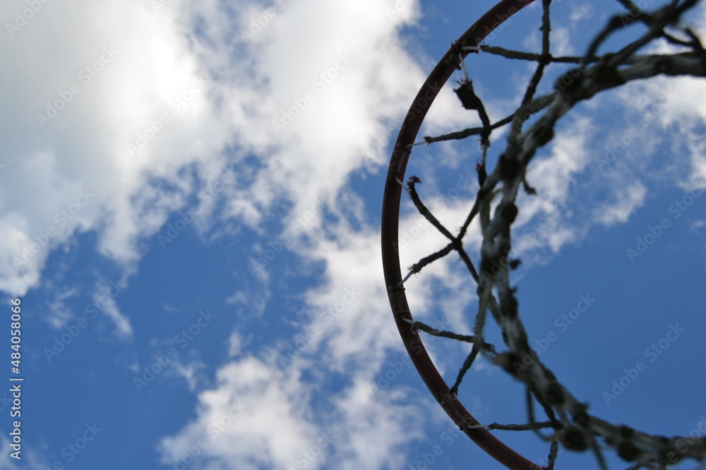 basketball hoop against blue sky basketball hoop against blue sky