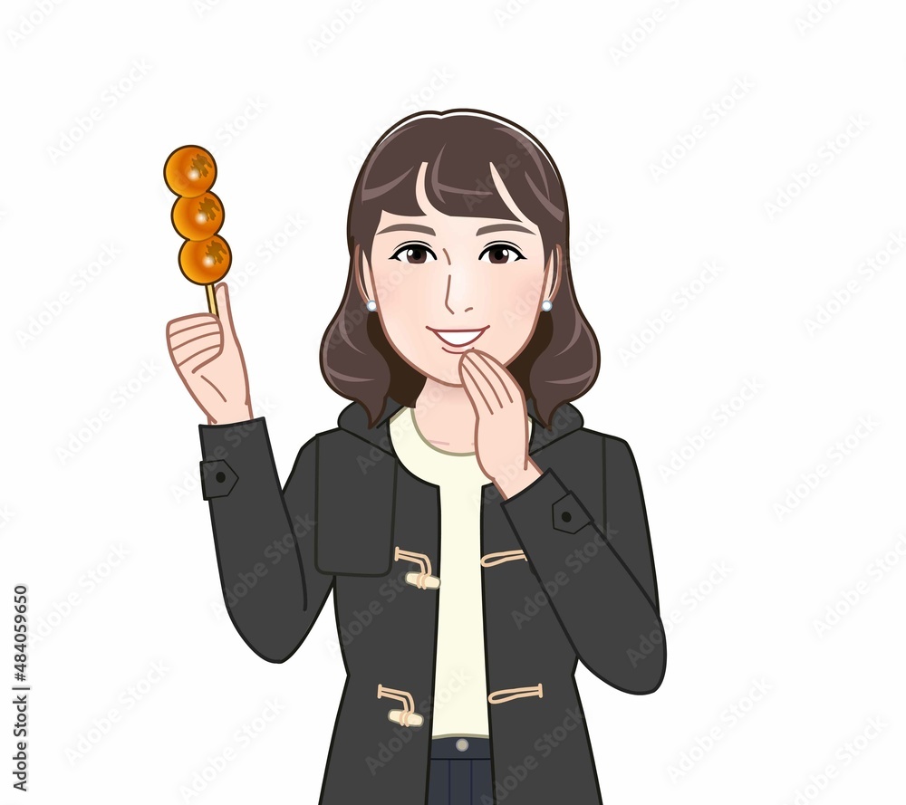 団子を持っている女性