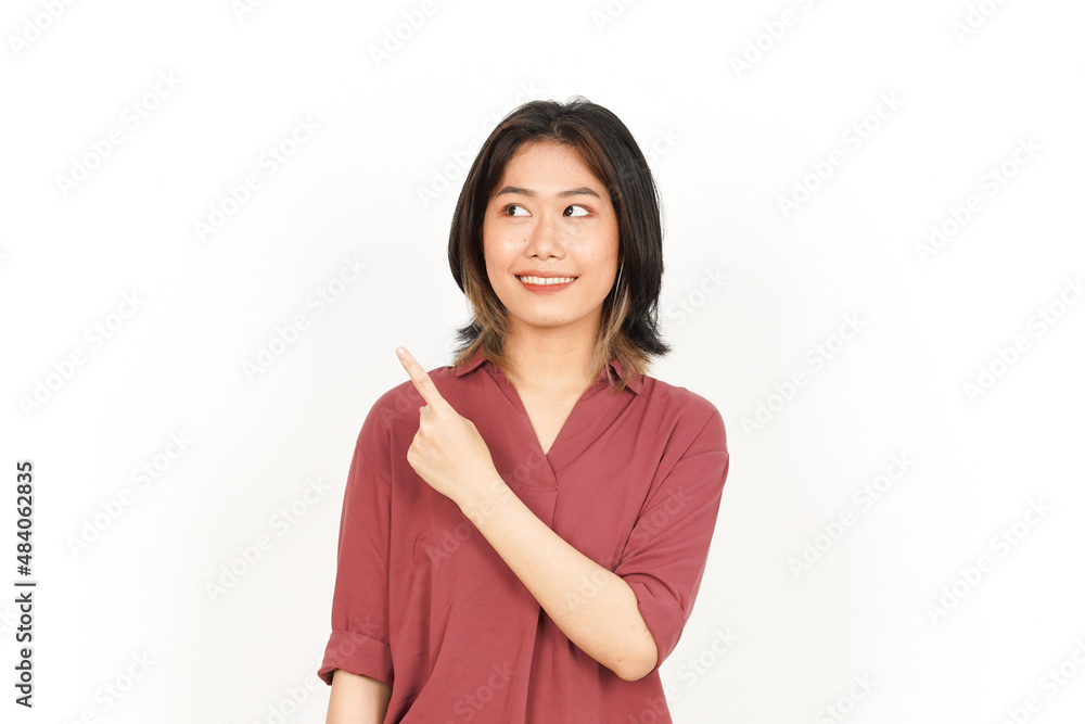 Showing and Pointing Product With Forefinger Of Beautiful Asian Woman Isolated On White Background Showing and Pointing Product With Forefinger Of Beautiful Asian Woman Isolated On White Background