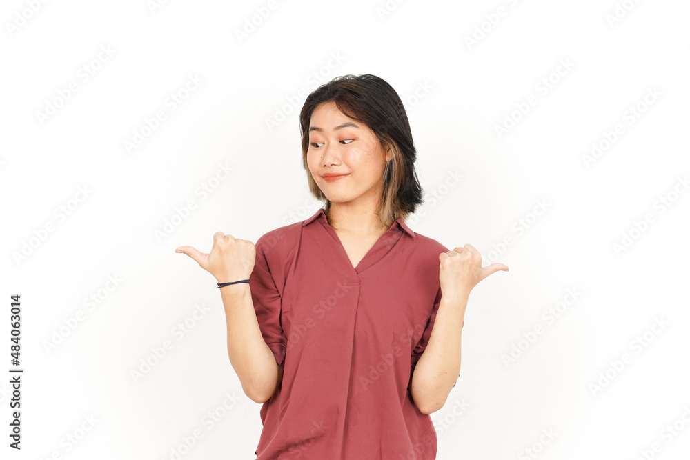 Showing and Pointing Two Product with Thumbs Of Beautiful Asian Woman Isolated On White Background Showing and Pointing Two Product with Thumbs Of Beautiful Asian Woman Isolated On White Background