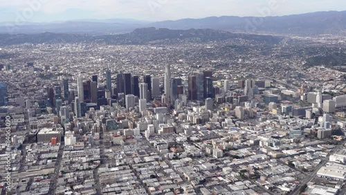 Aerial view of Downtown Los Angeles looking northwest with the Griffith Observatory and Hollywood Sign in the background