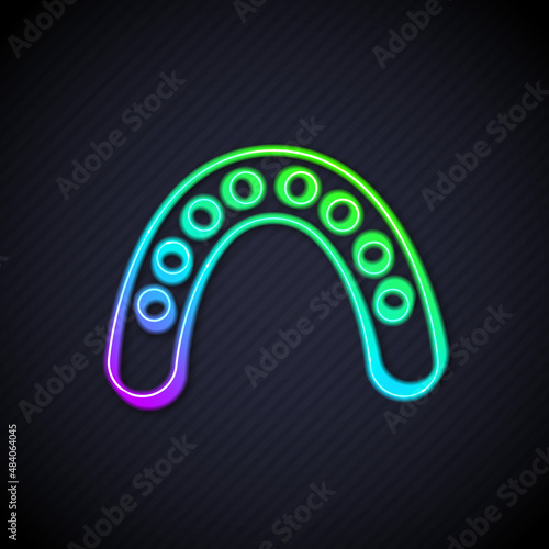Glowing neon line Mouth guard boxer icon isolated on black background. Vector