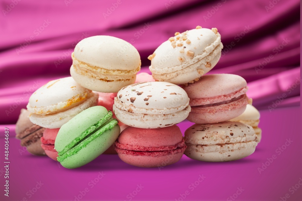 Tasty sweet macarons cakes of different colors. Culinary and cooking concept. Tasty sweet macarons cakes of different colors. Culinary and cooking concept.