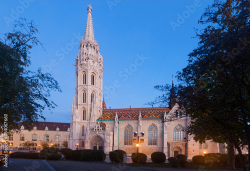 Lush Gothic architecture of Matthias Church on Buda hill in twilight, Hungary.