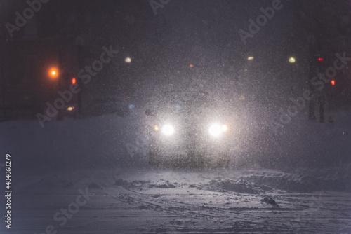 Headlights in the snowstorm