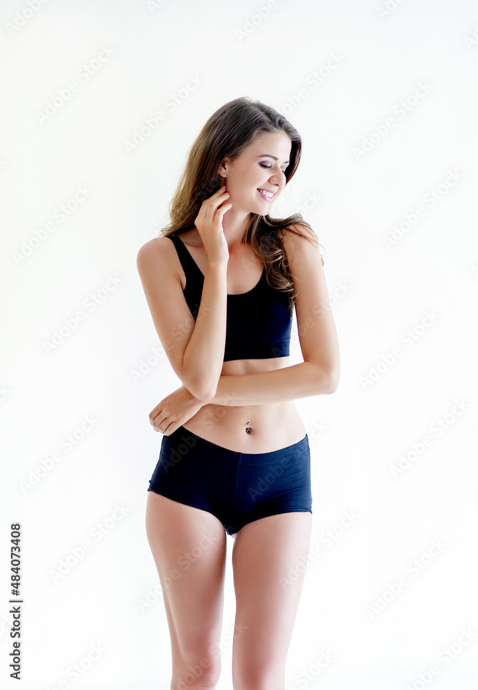 Girl working out in workout clothes and relaxing with a happy smile. isolated from a white background Exercise ideas for beautiful girls who love their health. Girl working out in workout clothes and relaxing with a happy smile. isolated from a white background Exercise ideas for beautiful girls who love their health.