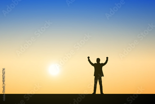 Silhouette of people standing raising hands. Illustration sunset background. Business  teamwork  goal and success concept.