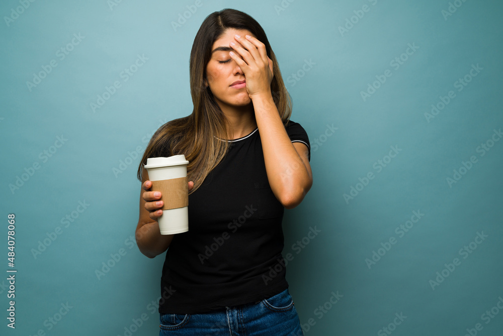 Exhausted woman getting up late Exhausted woman getting up late