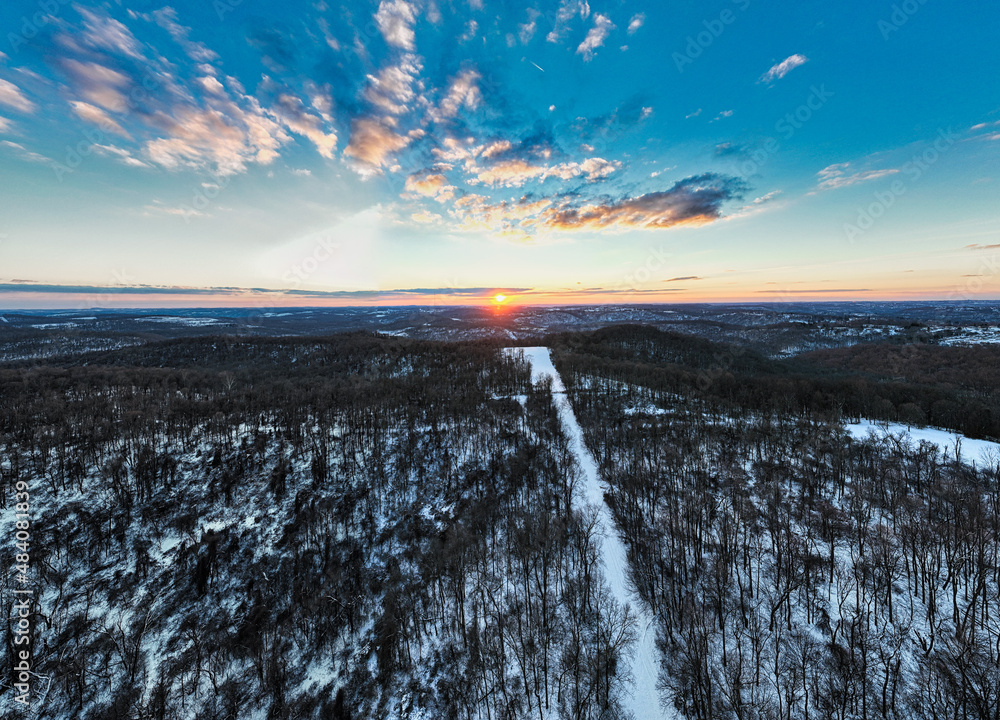 sunset landscape in the snowy mountains aerial sunset landscape in the snowy mountains aerial