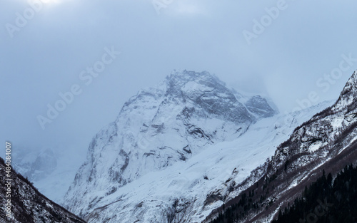 Mountain top surrounded by clouds. Greater Caucasus ridge © Maksim