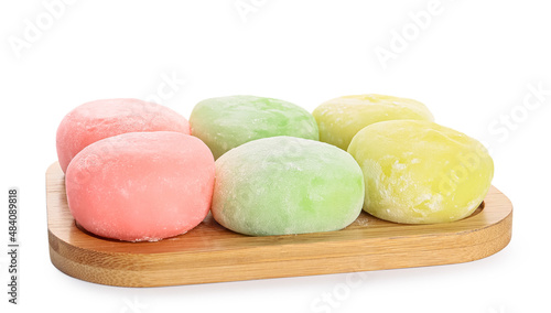 Board with delicious mochi on white background