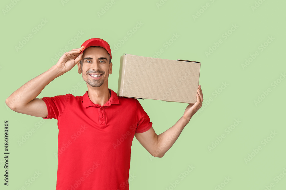Male courier with parcel on color background Male courier with parcel on color background