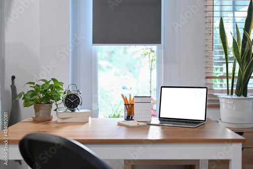 Wallpaper Mural Computer laptop, calendar, notebook an alarm clock on wooden table. Torontodigital.ca