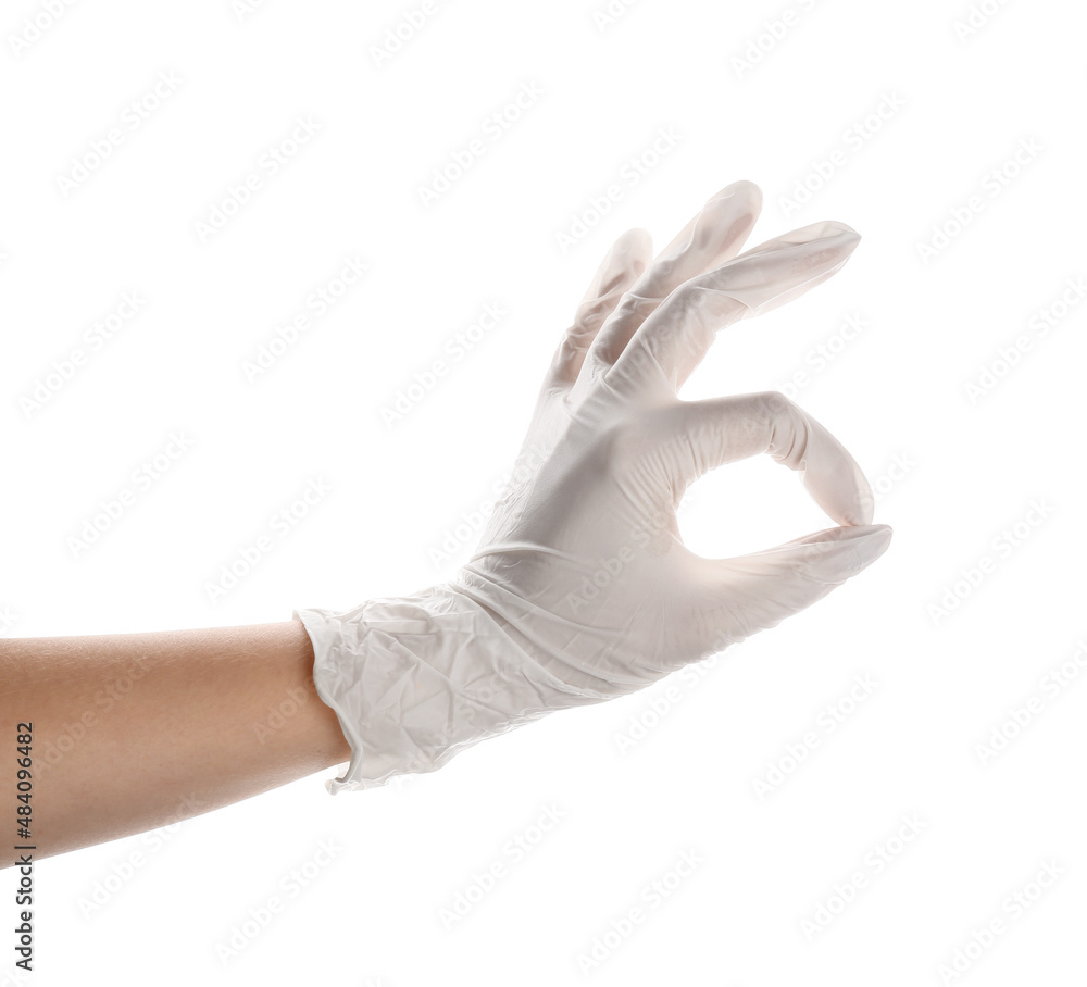 Woman in medical glove showing OK on white background