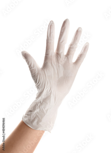 Human hand wearing a white ...