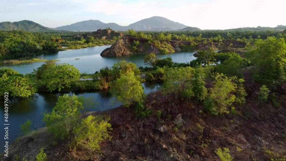 Aerial fly over abandoned mining site with water, Aerial fly over abandoned mining site with water,