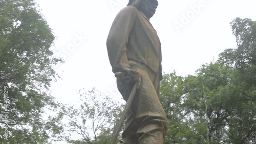 Pan shot of David Livingstone Statue at Victoria Falls, Zimbabwe photo