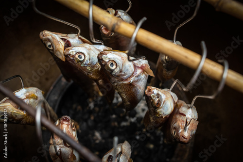 Fototapeta Naklejka Na Ścianę i Meble -  Chinese Hunan cuisine, making smoked cured fish