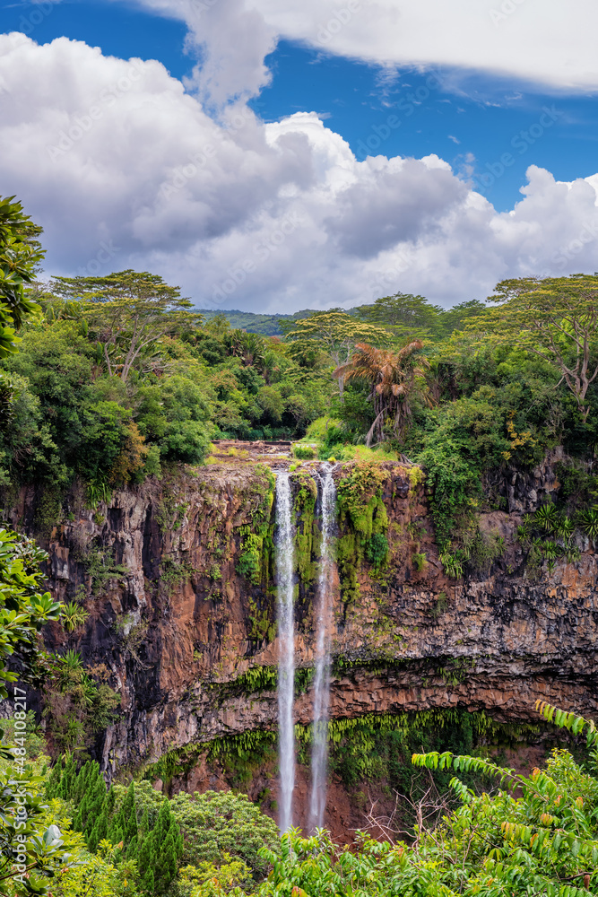 Fototapeta premium Chamarel Waterfalls in the jungle in tropical island of Mauritius. 