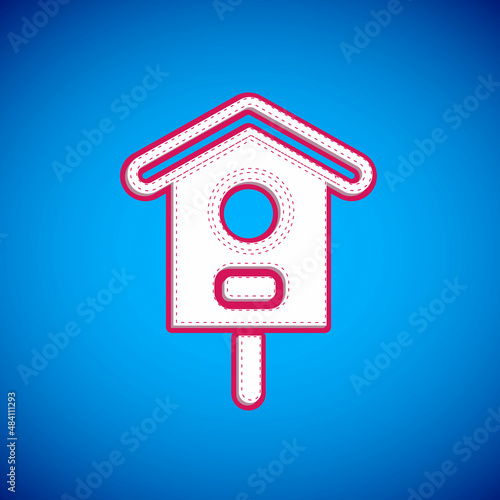 White Bird house icon isolated on blue background. Nesting box birdhouse, homemade building for birds. Vector