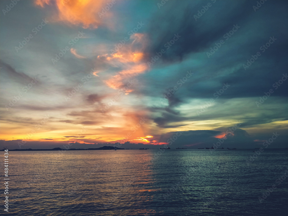 Beautiful sunset sky. Half orange, half blue.
Beautiful sunset sky. Half orange, half blue.