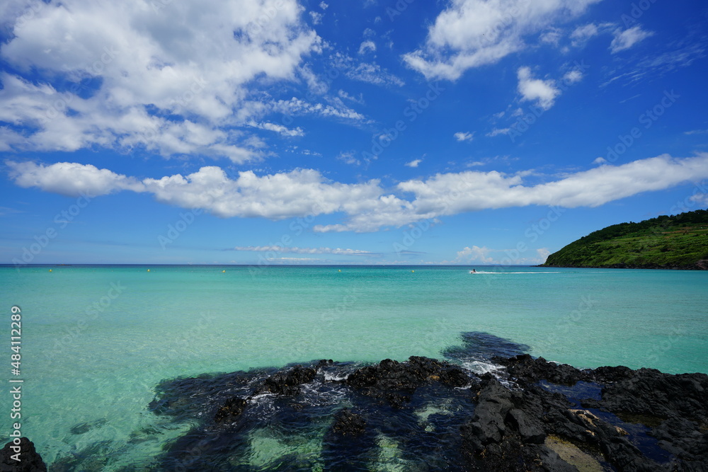 charming seascape: clear emerald sea and blue sky