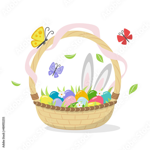 Easter wicker basket with painted eggs, spring grass and flowers, light pink ribbon, butterflies and bunny ears. Traditional vector element for event design. Isolated on white background.