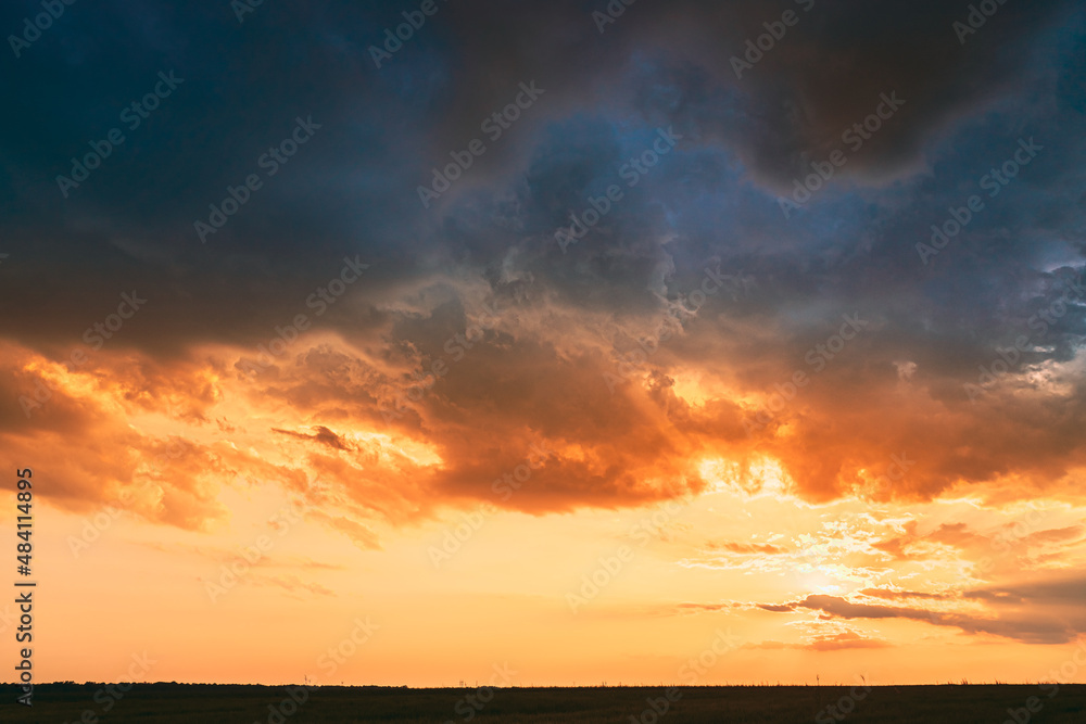 Meadow At Sunset Sunrise. Natural Bright Dramatic Sky In Different Colours Above Countryside Meadow Landscape. Agricultural Landscape In May.Meadow At Sunset Sunrise. Natural Bright Dramatic Sky In Meadow At Sunset Sunrise. Natural Bright Dramatic Sky In Different Colours Above Countryside Meadow Landscape. Agricultural Landscape In May.Meadow At Sunset Sunrise. Natural Bright Dramatic Sky In
