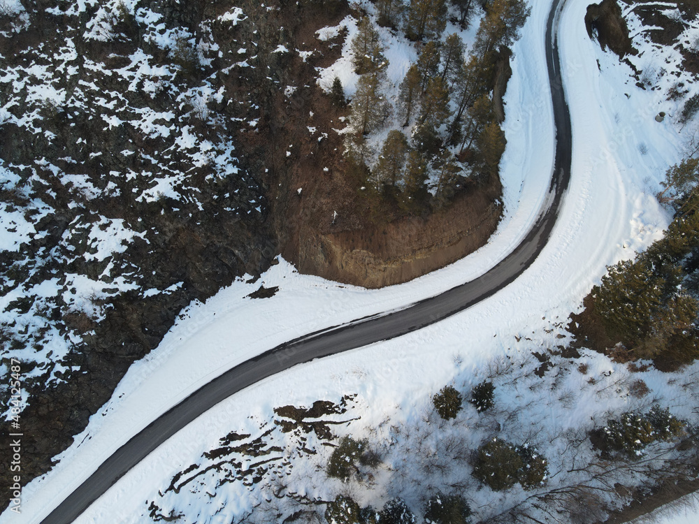 Natural winter landscape from air. Aerial view on the road and forest at the winter time..artvin .turkey Natural winter landscape from air. Aerial view on the road and forest at the winter time..artvin .turkey