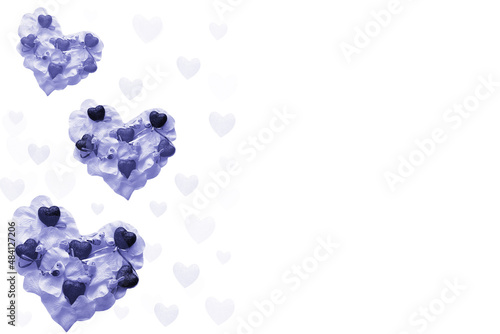 Three lilac hearts with birds and flowers on a white background. Valentine's Day card. Very Peri Color of the Year 2022. copy space.