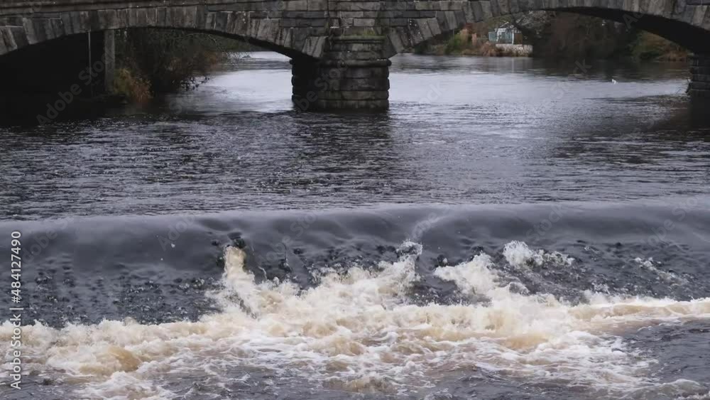 Close up of the River Cree flowing over the weir at Newton Stewart Close up of the River Cree flowing over the weir at Newton Stewart