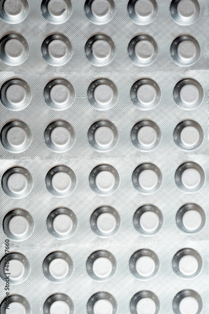 background, texture, tablets in silver plates, packages. background, texture, tablets in silver plates, packages.