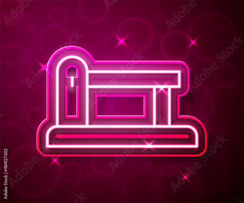Glowing neon line Railway barrier icon isolated on red background. Vector