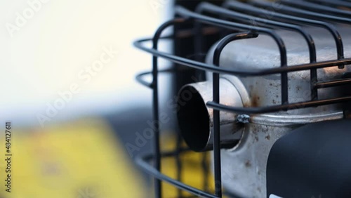 Cleaning the territory with the help of a snowblower during a snowfall. Close up.