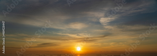 Wallpaper Mural Morning sky illuminated by sunrise light at the ocean. Torontodigital.ca