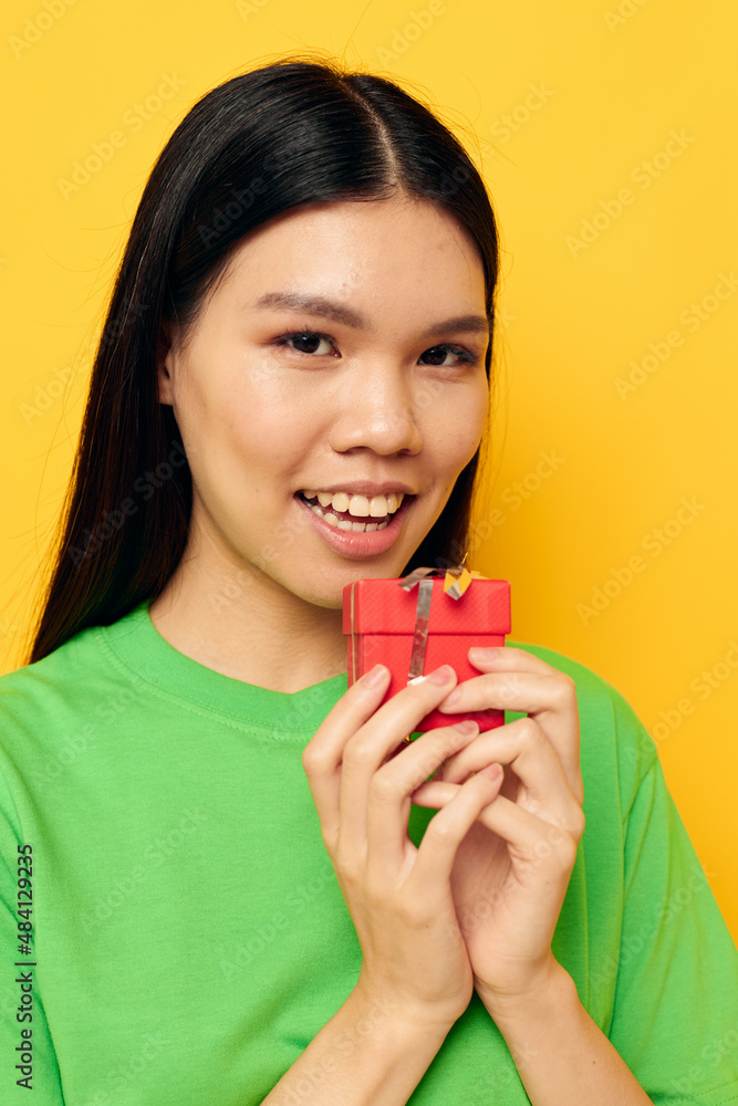 Portrait Asian beautiful young woman Red gift box happy Birthday isolated background unaltered Portrait Asian beautiful young woman Red gift box happy Birthday isolated background unaltered
