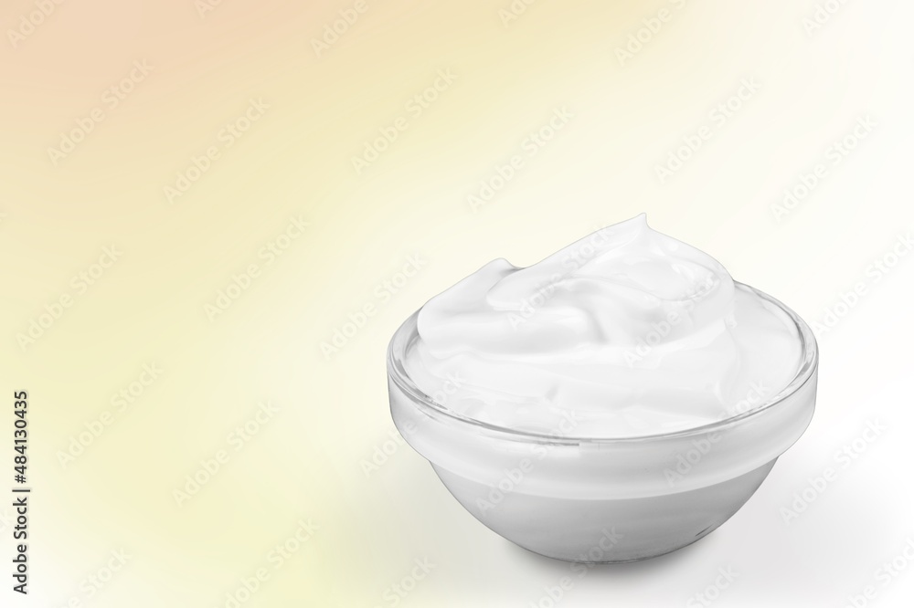 Glass bowl of whipped egg whites and sugar cream Glass bowl of whipped egg whites and sugar cream