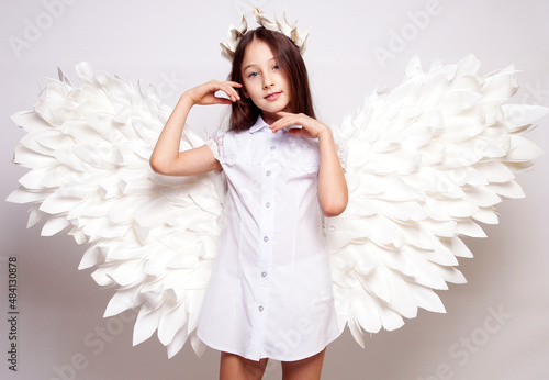 Pretty young lady with angel wings