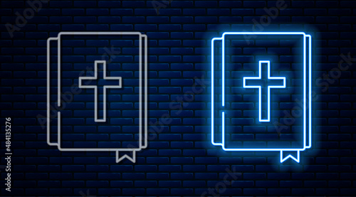 Glowing neon line Holy bible book icon isolated on brick wall background. Vector