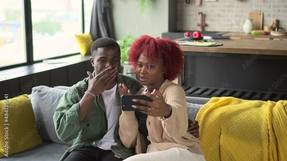 African couple wave hand at video call on phone Spbd. Black man and ...