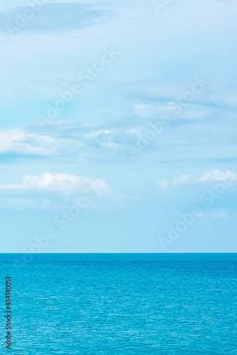 beautiful ocean and blue sky background. Relaxing, summer, travel, holiday and vacation concept
