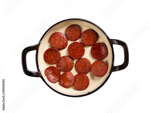 Turkish fried sausage (Turkish name; Turkish sucuk).sucuk in pan on the white background.
