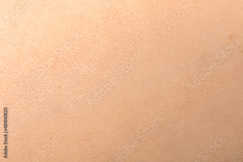 Human skin texture. Detail healthy pink skin background. Young girl, healthcare concept photo