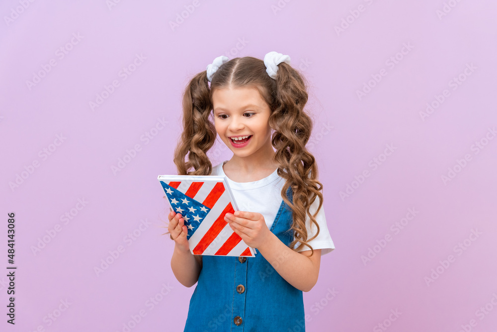 A school girl is reading an English textbook, Moving to the USA, getting an American education. A school girl is reading an English textbook, Moving to the USA, getting an American education.