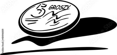 The five groszy coin casts a shadow on the desk 