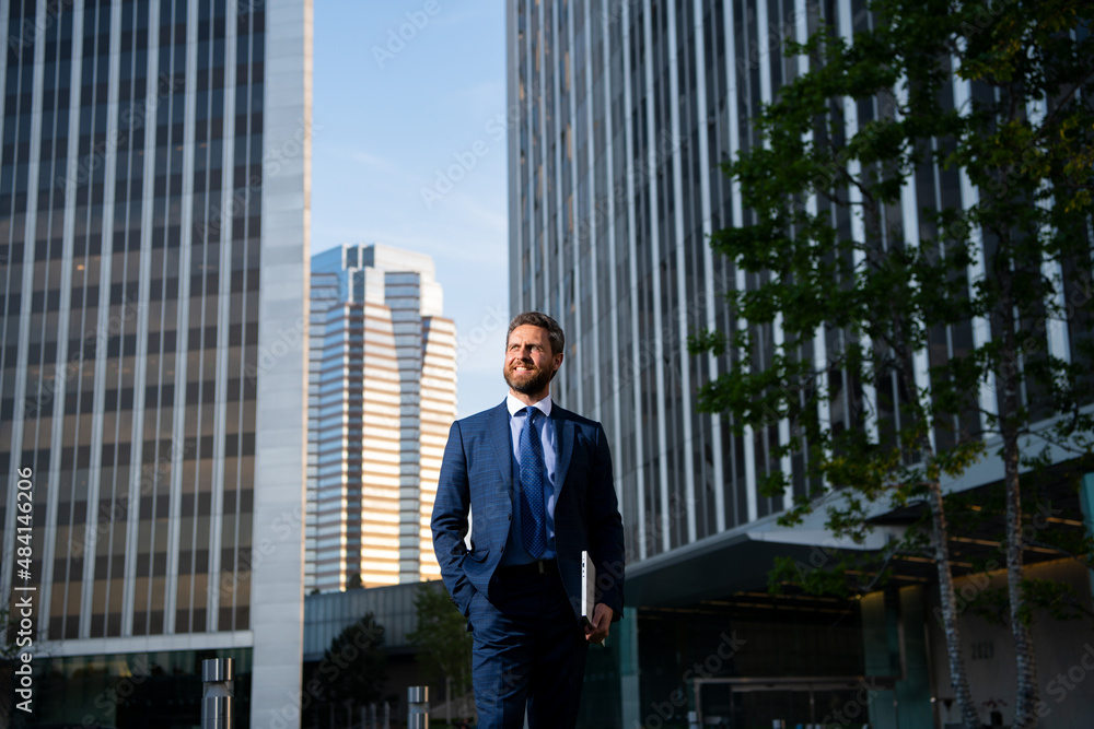Portrait of businessman standing in a office. Portrait of businessman standing in a office.