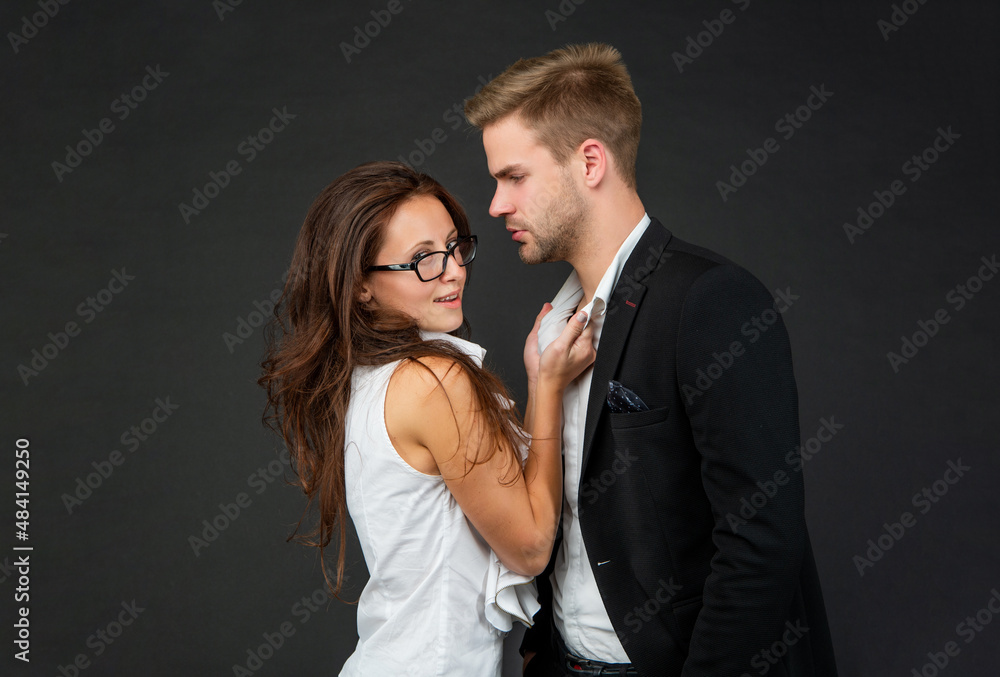formal couple in love of man and woman on black background, love