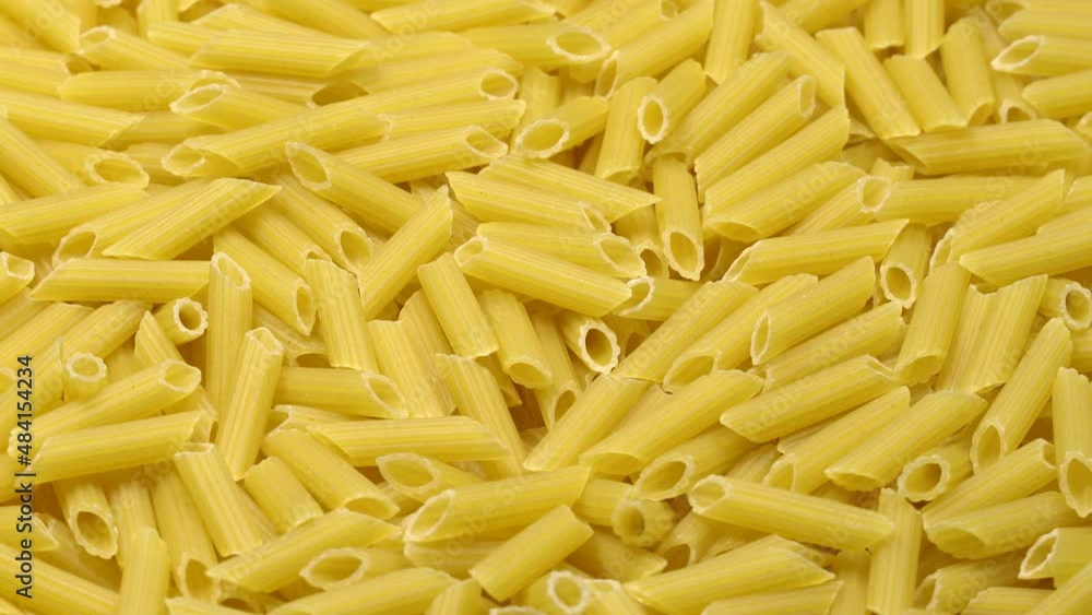 Pasta (macaroni) background rotation. Close up Pasta (macaroni) background rotation. Close up