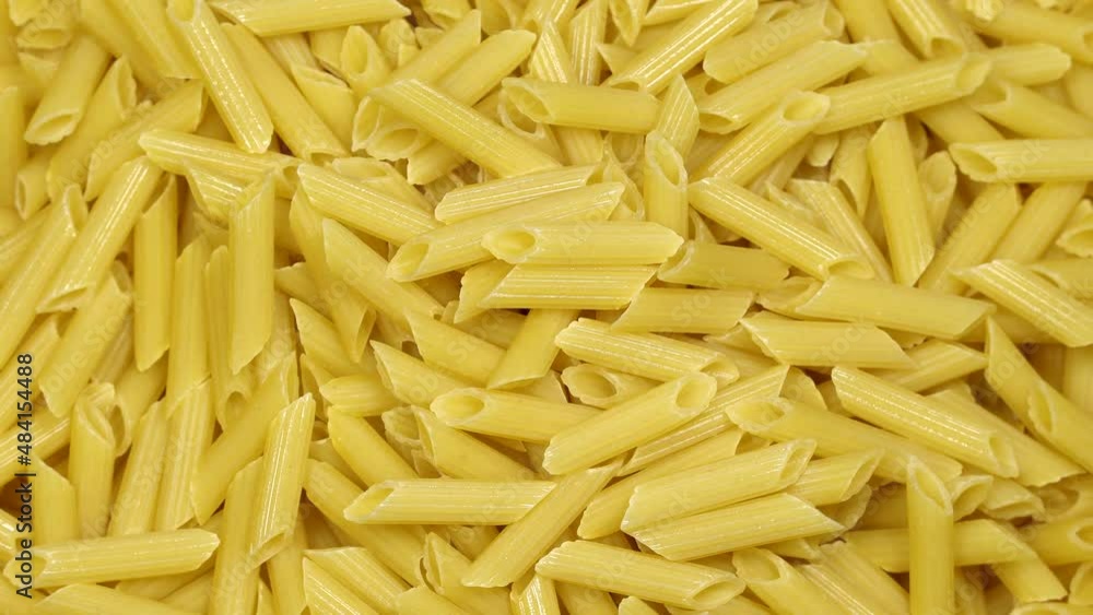 Pasta (macaroni) background rotation. Close up Pasta (macaroni) background rotation. Close up